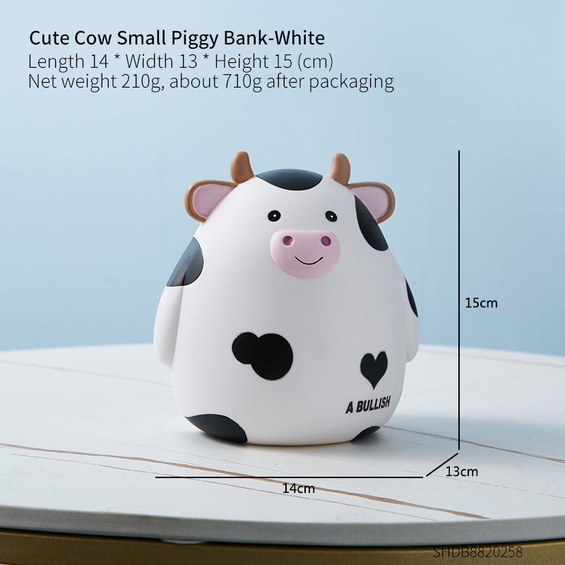 Cute cow-shaped piggy bank with dimensions and weight information on a light blue background